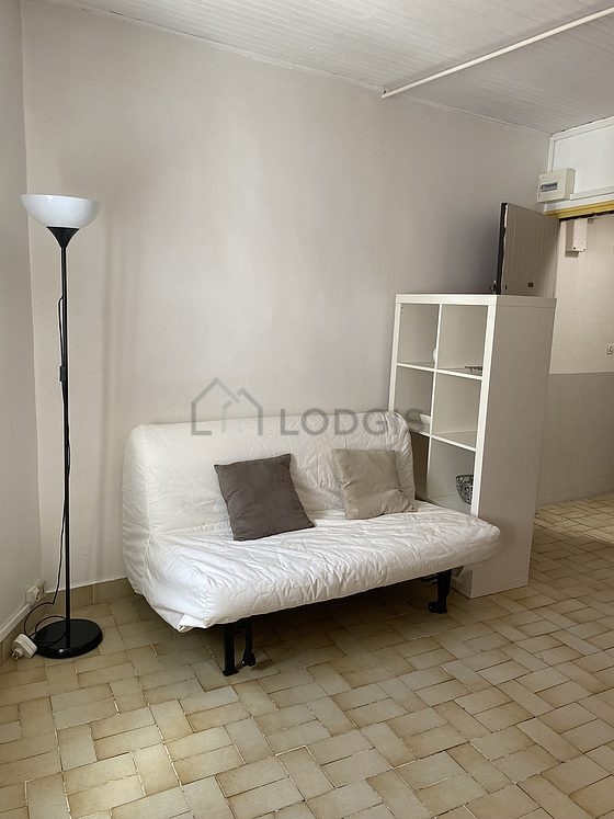 Living room furnished with dining table, 1 chair(s)