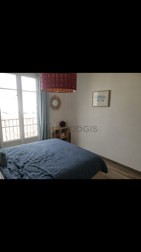Bedroom with wooden floor