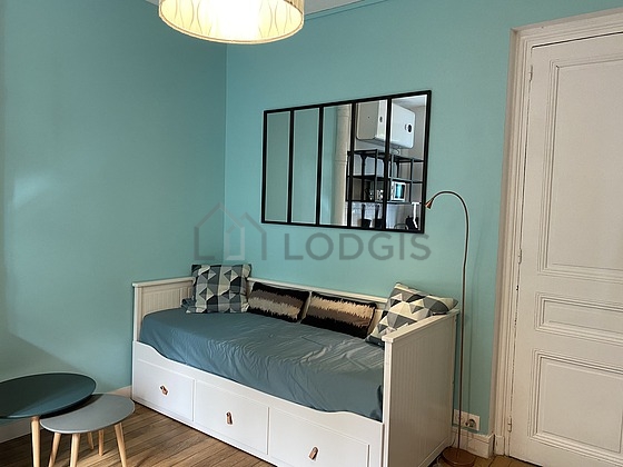 Very quiet living room furnished with 1 bed(s) of 90cm, coffee table, closet