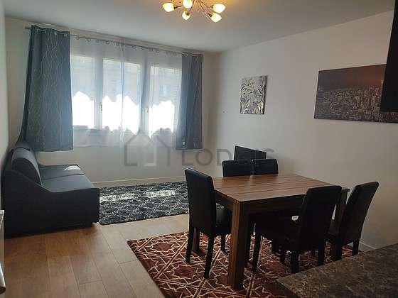 Very quiet living room furnished with tv, closet, 1 chair(s)