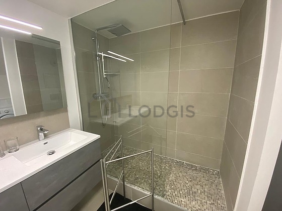 Bathroom equipped with washing machine, dryer