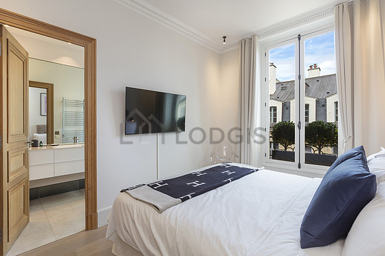 Bedroom with wooden floor