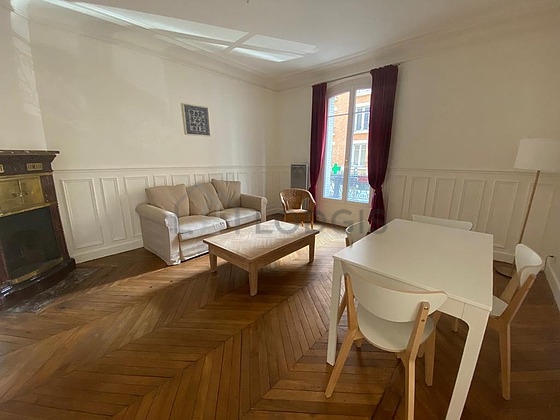 Quiet living room furnished with sofa, coffee table, 5 chair(s)