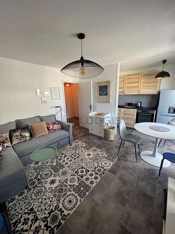 Living room furnished with tv, storage space, 1 chair(s)