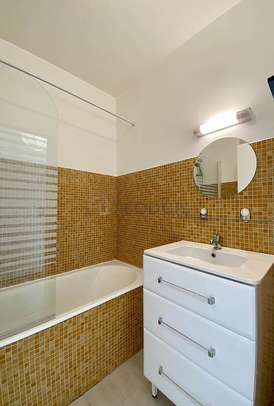 Beautiful and bright bathroom with tile floor