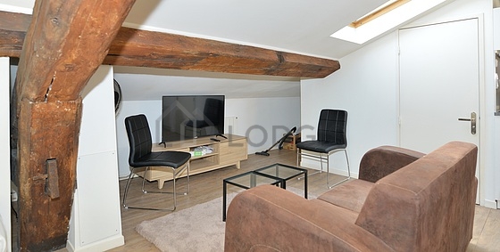 Séjour d'un appartement à Paris