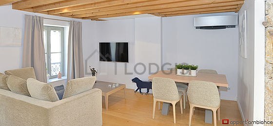 Séjour équipé de 1 canapé(s) lit(s) de 140cm, air conditionné, télé, 1 chaise(s)