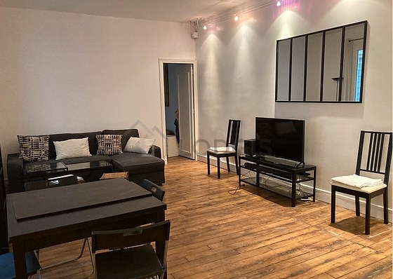 Quiet living room furnished with 1 sofabed(s) of 140cm, tv, cupboard, 1 chair(s)