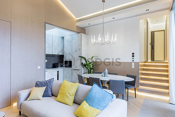 Very quiet living room furnished with tv, 1 chair(s)