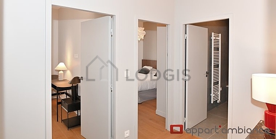 Bedroom equipped with 1 armchair(s), bedside table