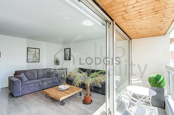 Séjour d'un appartement à Paris