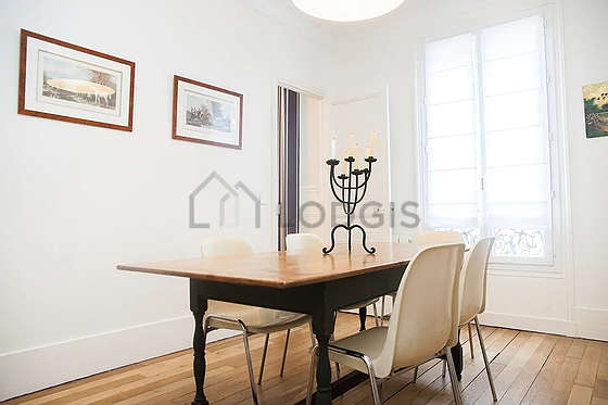 Dining room equipped with dining table, storage space
