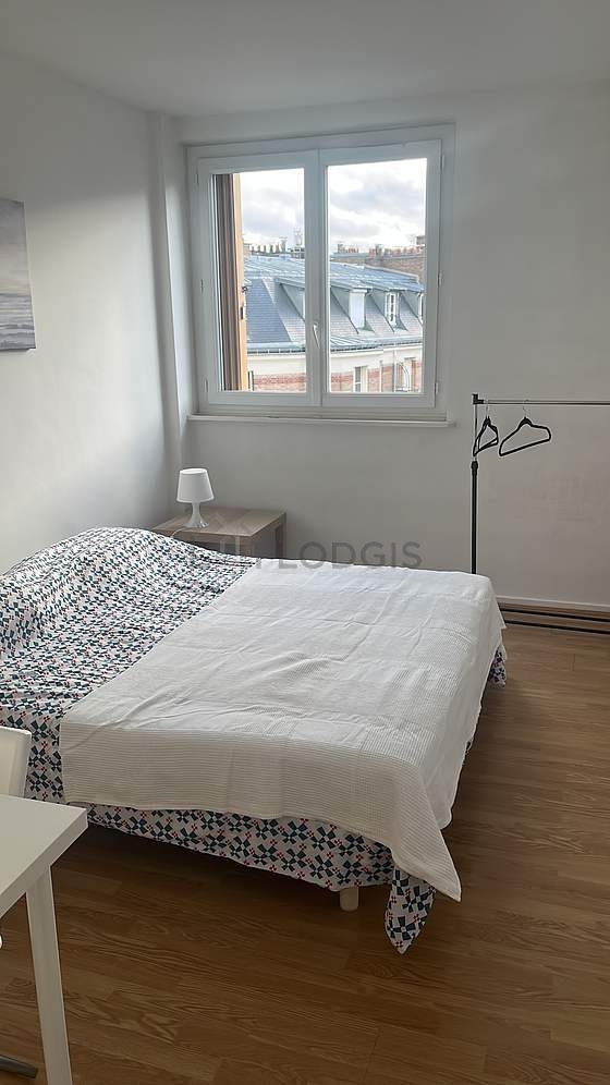 Bedroom with wooden floor