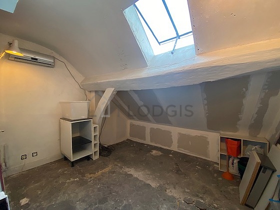 Attic with floor tiles floor