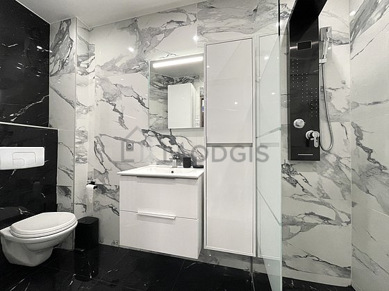 Bathroom equipped with washing machine, dryer