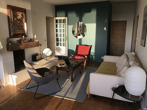 Living room furnished with sofa, 1 armchair(s)