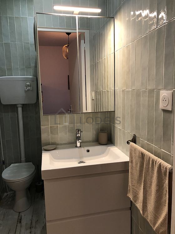 Bathroom equipped with cupboard