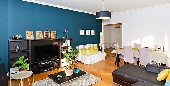 Living room furnished with tv, hi-fi stereo, closet, 1 chair(s)