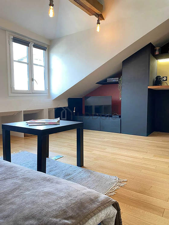 Living room furnished with 1 sofabed(s) of 140cm, tv, 1 chair(s)