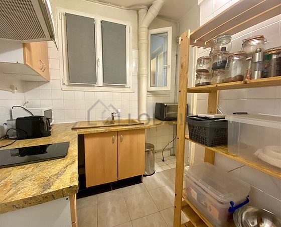 Kitchen equipped with washing machine, dryer, refrigerator, freezer
