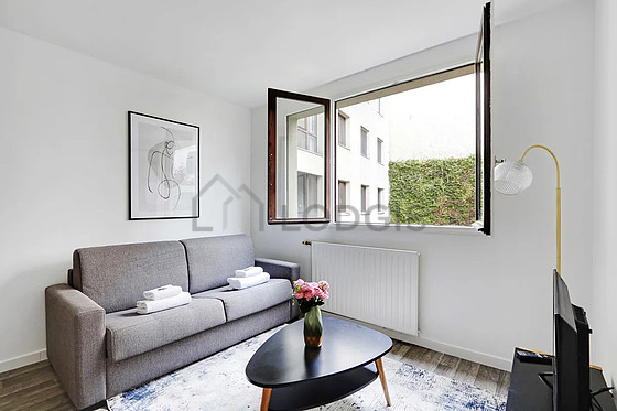 Living room furnished with 1 sofabed(s) of 140cm, 1 bed(s) of 140cm, tv, 1 chair(s)
