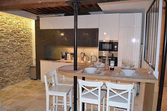 Kitchen where you can have dinner for 5 person(s) equipped with washing machine, dryer, refrigerator, freezer