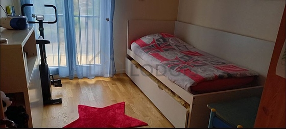 Bedroom with wooden floor