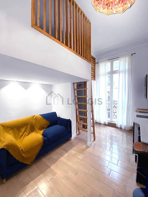 Living room furnished with 1 sofabed(s) of 140cm, tv