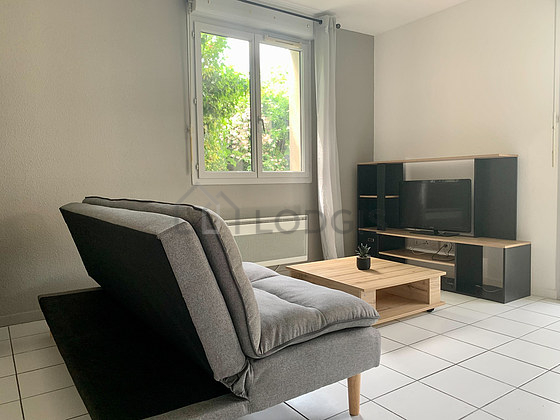 Living room with tile floor