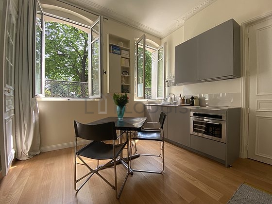 Quiet living room furnished with 1 bed(s) of 140cm, tv, cupboard, 1 chair(s)