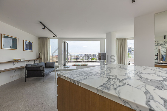 Kitchen equipped with crockery, stool