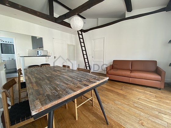 Living room furnished with 1 sofabed(s) of 140cm, tv, 1 chair(s)