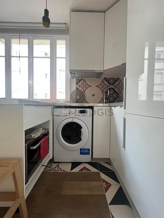 Kitchen where you can have dinner for 2 person(s) equipped with washing machine, dryer, refrigerator