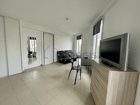 Living room with tile floor