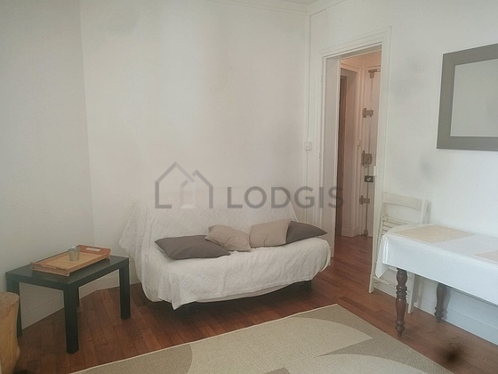 Séjour équipé de 1 canapé(s) lit(s) de 140cm, télé, 1 chaise(s)
