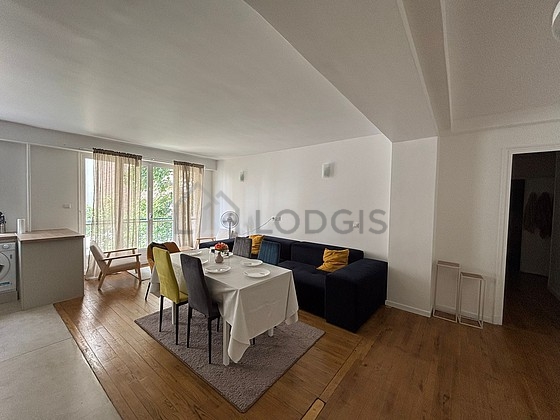 Living room furnished with tv, 1 armchair(s), 1 chair(s)