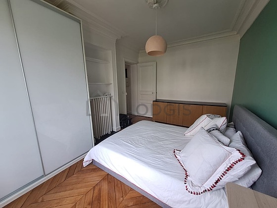 Bedroom with wooden floor