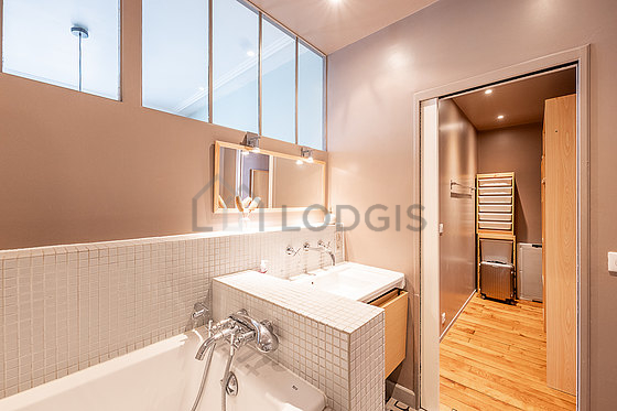Bathroom equipped with shelves