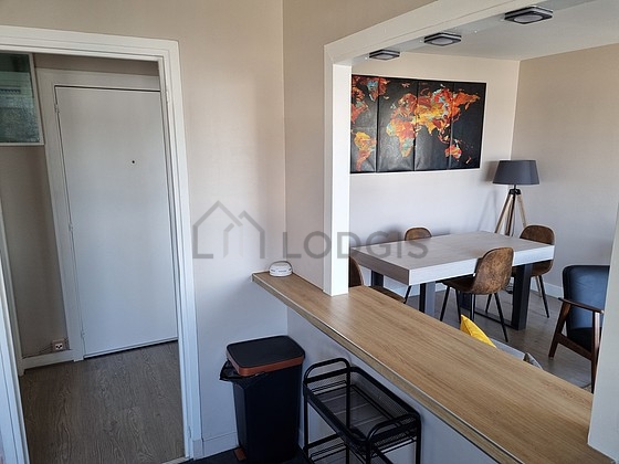 Kitchen equipped with washing machine, dryer, refrigerator, extractor hood