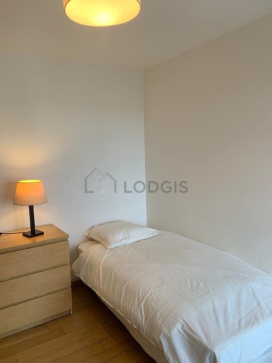 Bedroom with wooden floor