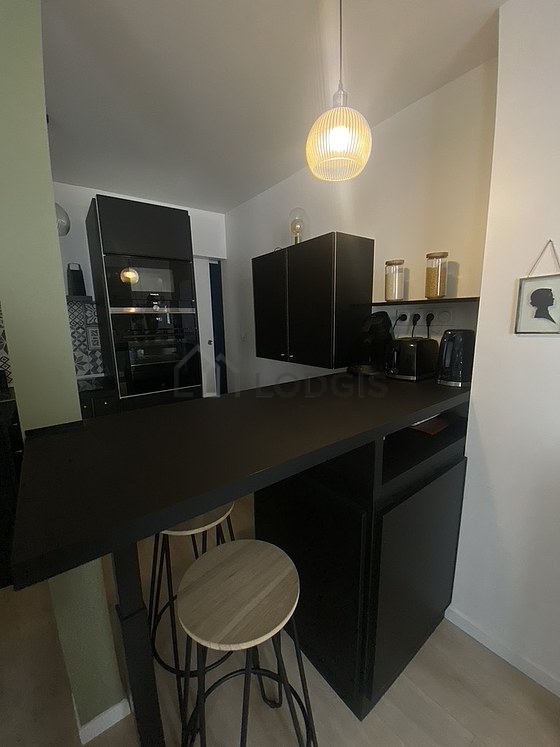 Kitchen where you can have dinner for 2 person(s) equipped with washing machine, refrigerator, crockery