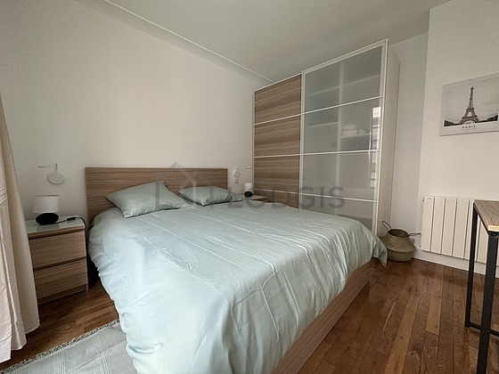 Bedroom with wooden floor
