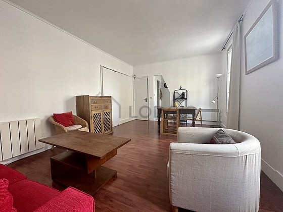 Living room furnished with 1 sofabed(s) of 140cm, tv, 1 armchair(s), 3 chair(s)