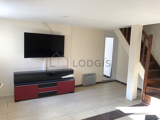 Living room with tile floor