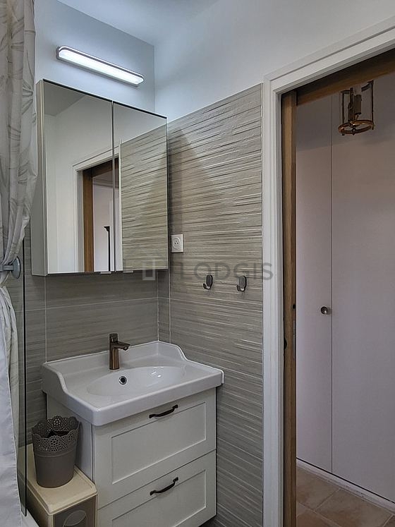 Bathroom equipped with cupboard