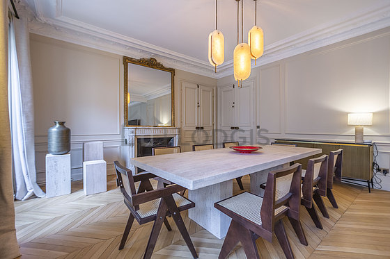 Dining room equipped with dining table, sideboard