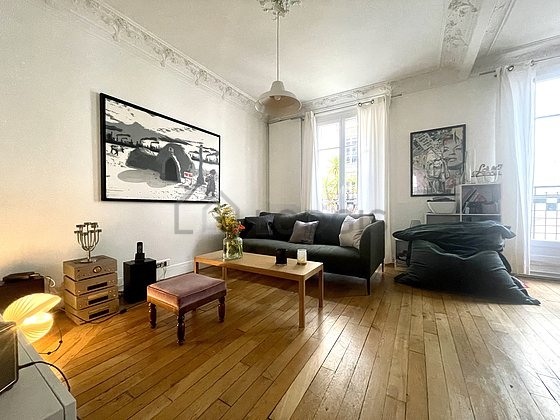 Living room furnished with tv, 1 armchair(s), 1 chair(s)