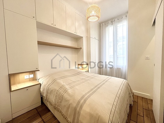 Bedroom with wooden floor