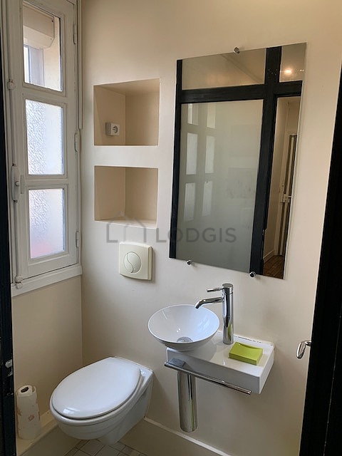 Bathroom equipped with shelves