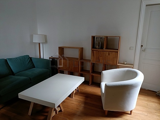 Very quiet living room furnished with sofa, 1 armchair(s)